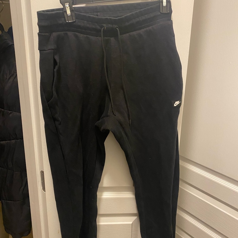 Nike Black Sweatpants with Elastic Waistband and Tapered Leg